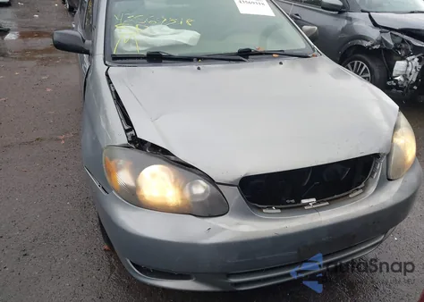 2004 Toyota Corolla Ce z USA, uszkodzony, nr VIN JTDBR32E942017219